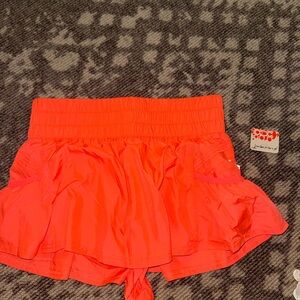 Free people orange athletic shorts size S